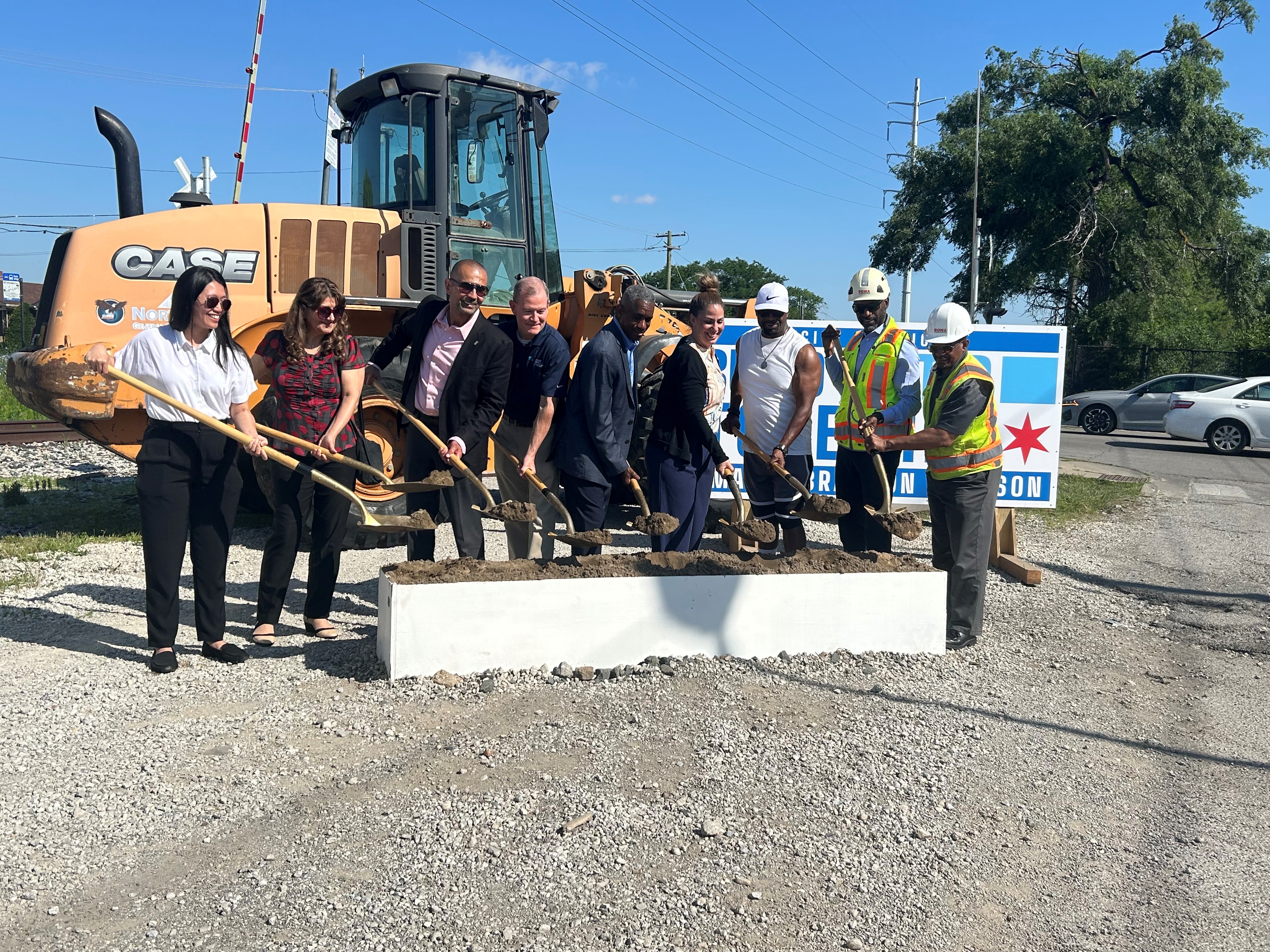 City officials take part in a ceremonial groundbreaking 